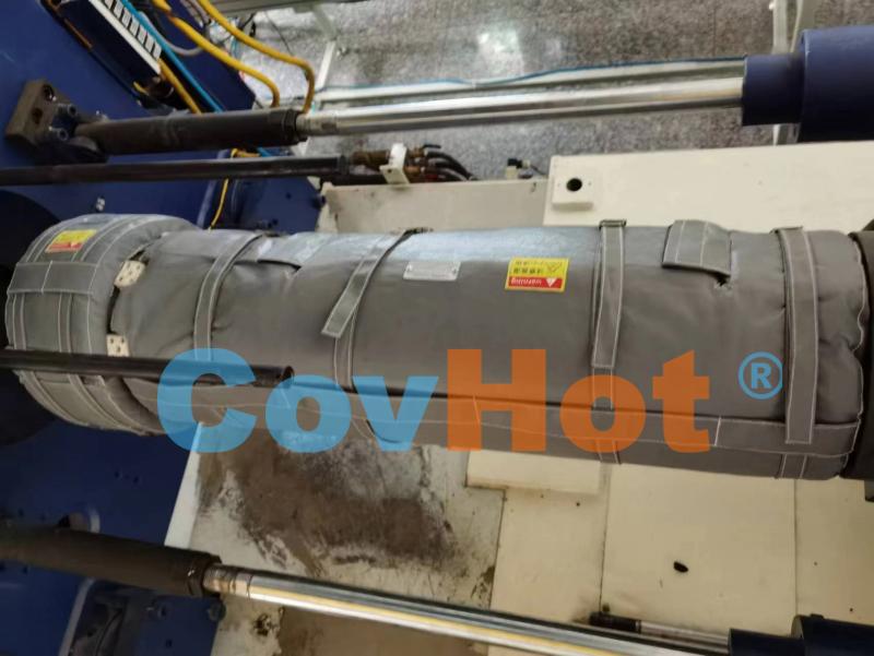 為注塑機節(jié)能“穿衣”，每年省下可觀電費——可拆卸保溫套的經(jīng)濟賬